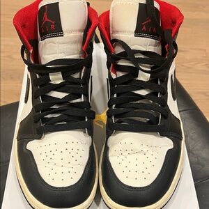 Air Jordan 1 Mid Athletic Shoes in Black, White, and Red